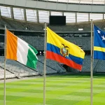 World Cup 2026 Group E featuring Germany, Ivory Coast, Ecuador and Curaçao national flags in stadium setting